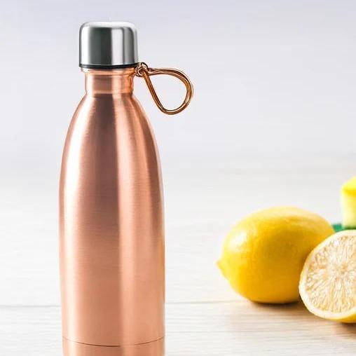 Drinking Water In  Copper Bottle
